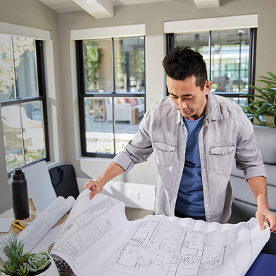 Architect looking at  technical documents