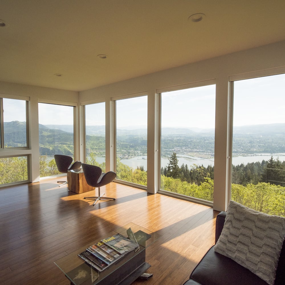 Floor to ceiling windows overlooking stunning river valley views