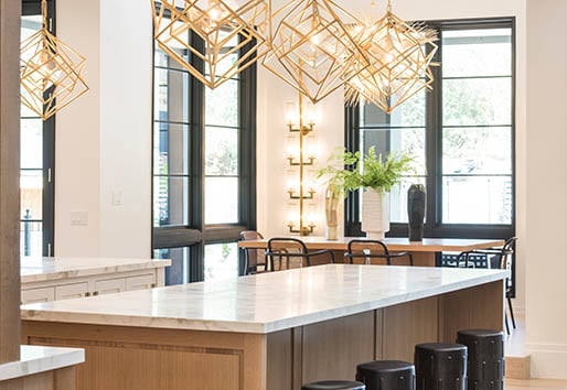 Indoor Outdoor Living Kitchen with Large Black Windows