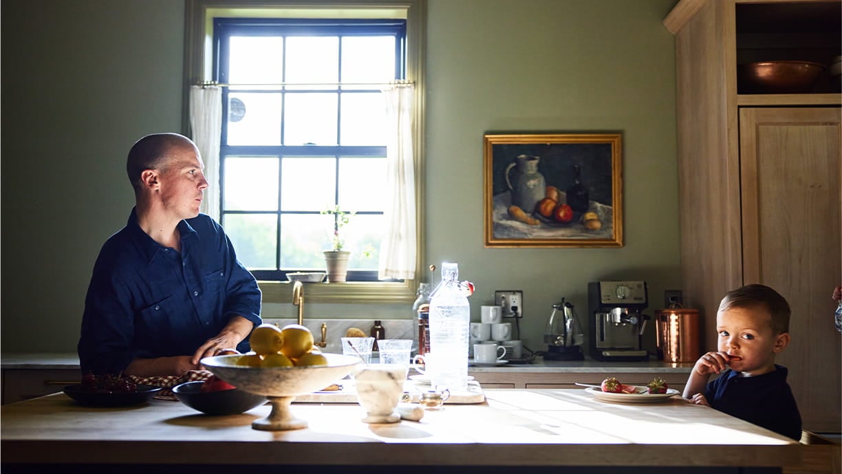 Father and son at kitchen table