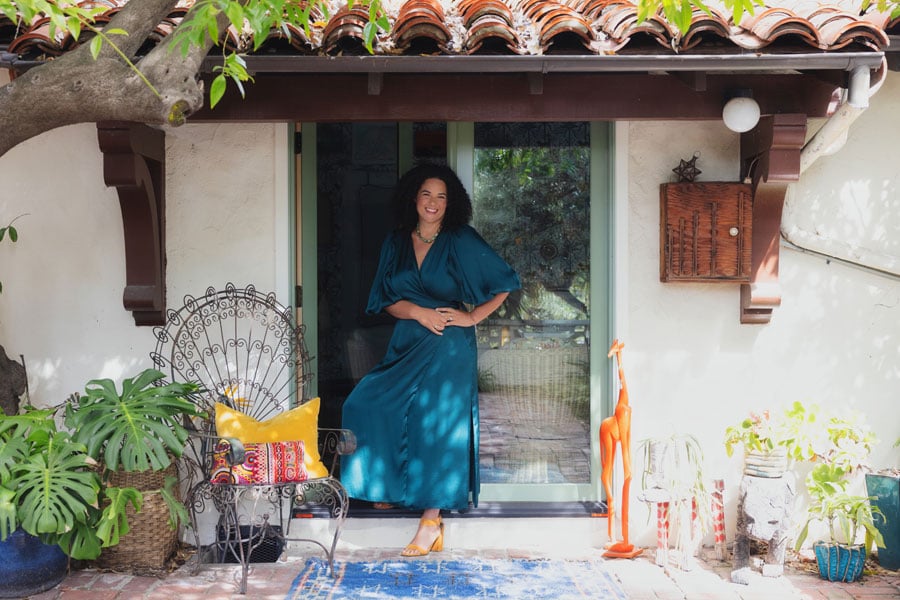 woman standing in front of front door