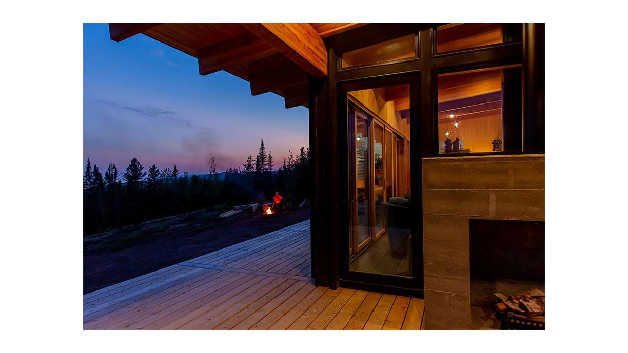 exterior view of deck on home at night