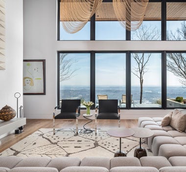 living room with black framed andersen 400 series windows