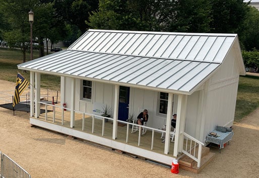 Concept home white tin roof with small porch 