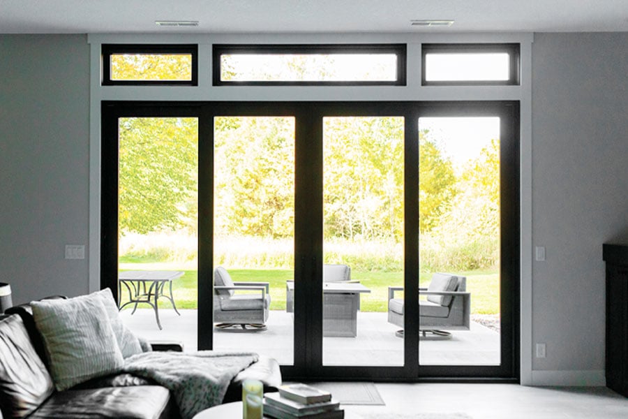 andersen black framed gliding patio door in livingroom