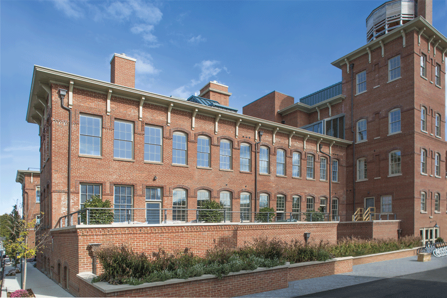 Old watchase factory that has been renovated into residential condos using Andersen windows.