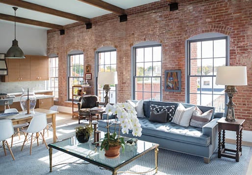 Exposed Brick Wall with Double-Hung Windows