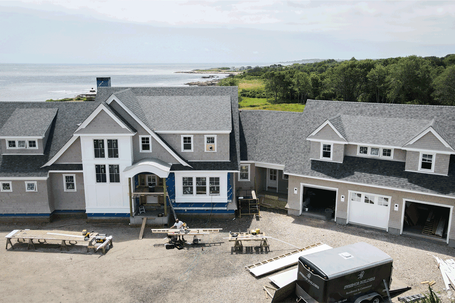 An under-construction home with oceanside views by Sweenor Builders.