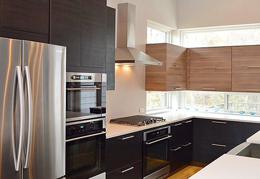 modern kitchen with dark cabinets with Andersen windows