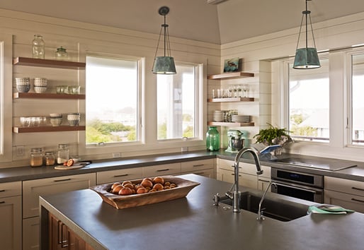 concrete accents in kitchen with Andersen windows