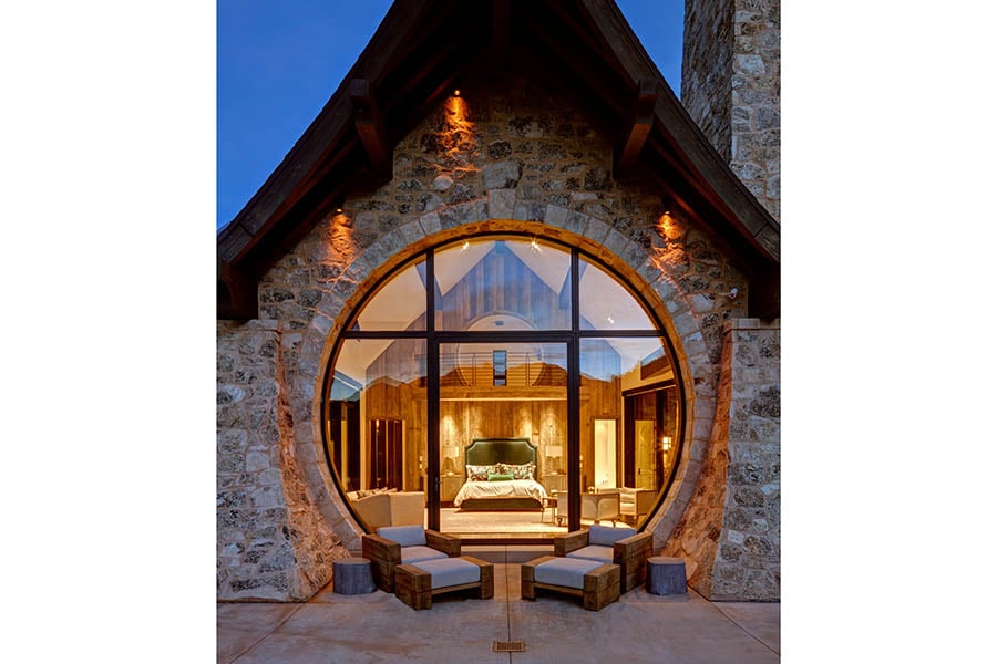 Utah mountain home with Andersen pivot door and specialty rounded windows
