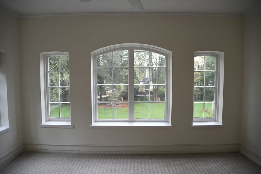 The south wall of Hilton Carter’s sunroom featured three windows before renovation