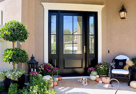 colorful home front entrance with dark andersen door