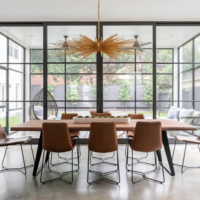 Dining room with floor-to-ceiling black windows