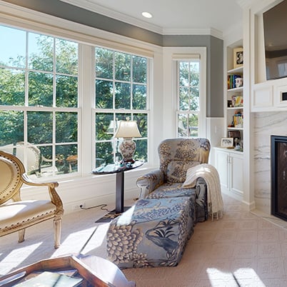 Andersen Windows Project Iverson Home Sitting Area with White A-Series Double-Hung Windows