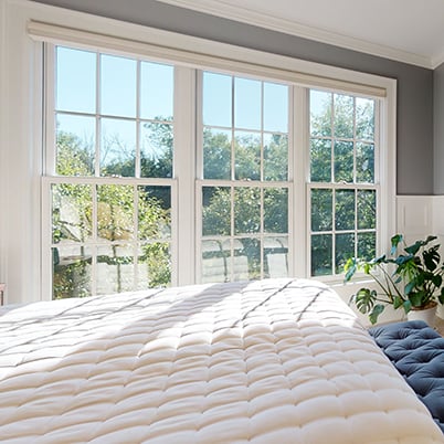 Andersen Windows Project Iverson Home Bedroom Featuring White A-Series Double-Hung Windows