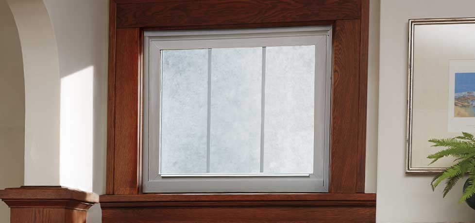 traditional window with white vinyl insert