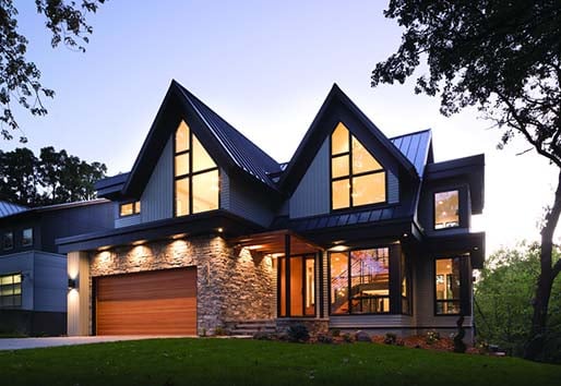 Exterior of modern home with large Andersen 400 Series Picture Windows.